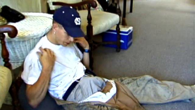 While on a break from doing yard work, Shane strips naked and starts getting stiff. He works the remote, and his cock, until finally pumping a messy cum load onto a towel.