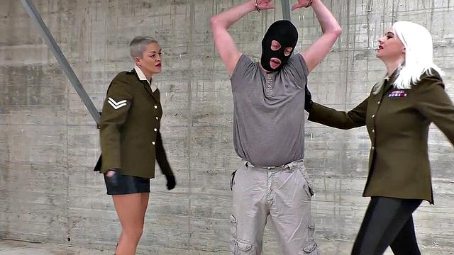 Army CFNM femdoms enjoy outdoor BDSM ballbusting of the sub