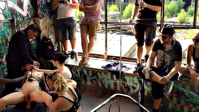 BDSM babe anally drilled and spanked by crowd in public