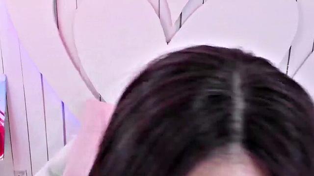 Cute young woman pounding her pussy