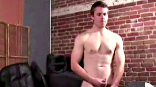 It doesn't take long for Holden Slayer to strip off his clothes and work up a boner. Once hard he strokes his cock and plays with his balls to coax out a huge cum load.