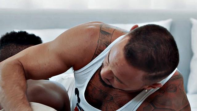 Gay tattooed hunk rims and bangs ebony BF on the bed