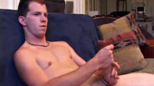 As a porn video plays, Raven strips naked and frees his vein popping. He strokes it with both hands and in no time explodes an amazing cum load on his chest.