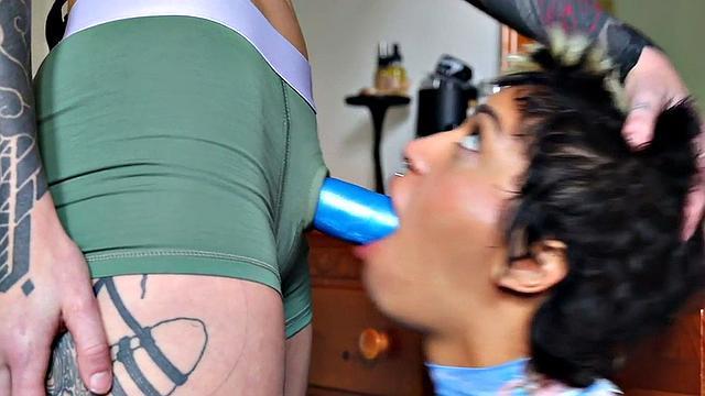 Tattooed amateur fucks GF with strapon at home