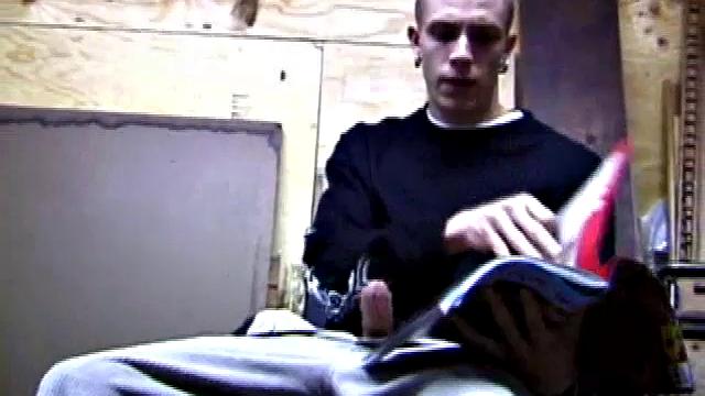 Returning home from work, Shane grabs a porn magazine and heads for the garage. There, he strokes his hard cock, while eating his pre-cum, and then pumps onto his belly.