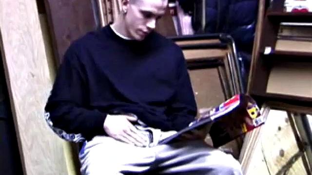 Returning home from work, Shane grabs a porn magazine and heads for the garage. There, he strokes his hard cock, while eating his pre-cum, and then pumps onto his belly.