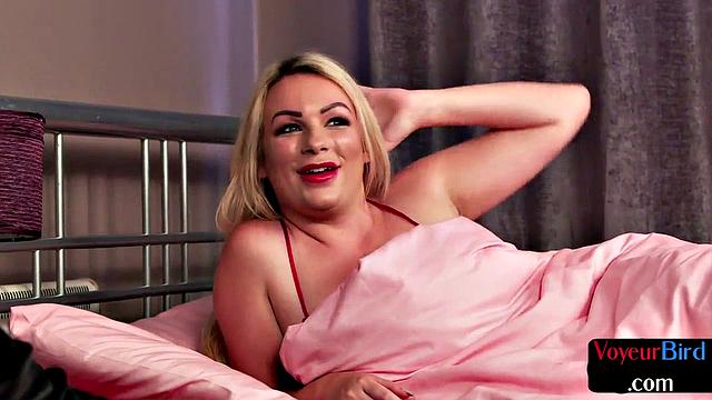 Busty blonde voyeur watches guy jerk off