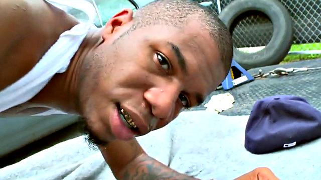 A hot black bottom get pounded outdoors after a steamy interracial blowjob and t-shirt play