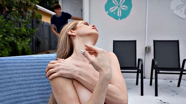 Cockhungry stepmom bouncing on a cock by the outdoor pool