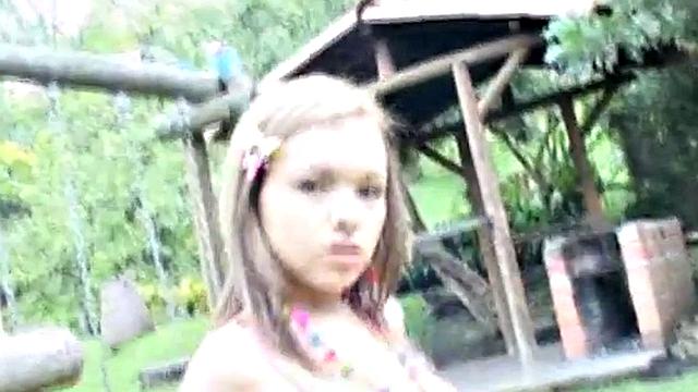 Shaved teen babe fingers her pussy