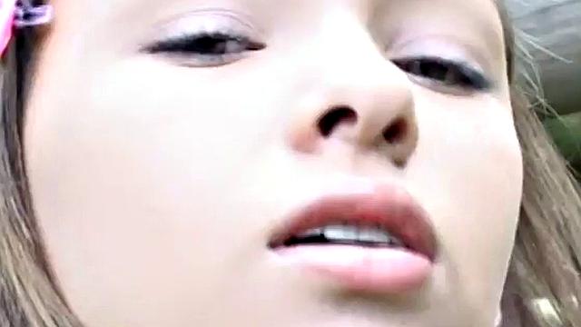 Shaved teen babe fingers her pussy