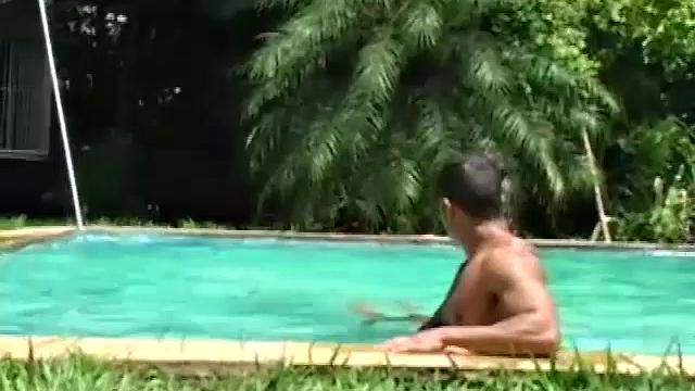 Ramon is alone in the pool doing power laps when Rodrigo jumps in. The two big dicked muscle hunks affectionately pose, and kiss, before moving behind a hidden statue nook.