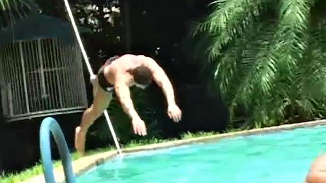 Ramon is alone in the pool doing power laps when Rodrigo jumps in. The two big dicked muscle hunks affectionately pose, and kiss, before moving behind a hidden statue nook.