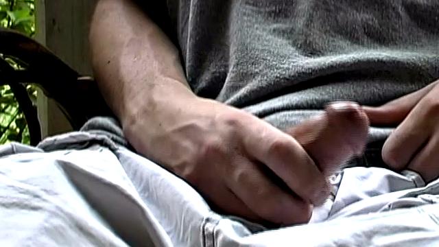 Adorable 18 year old Donavin Fitch finds himself alone at the country cabin and horny. On the porch, he parks himself in a chair and pulls out his growing dick.