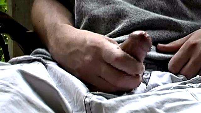 Adorable 18 year old Donavin Fitch finds himself alone at the country cabin and horny. On the porch, he parks himself in a chair and pulls out his growing dick.