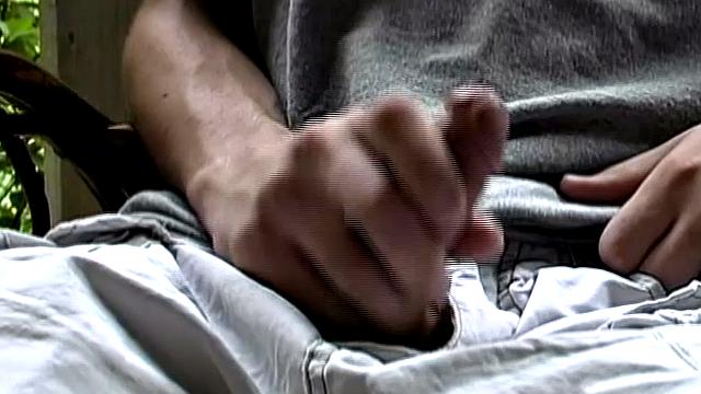 Adorable 18 year old Donavin Fitch finds himself alone at the country cabin and horny. On the porch, he parks himself in a chair and pulls out his growing dick.