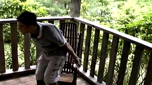 Adorable 18 year old Donavin Fitch finds himself alone at the country cabin and horny. On the porch, he parks himself in a chair and pulls out his growing dick.