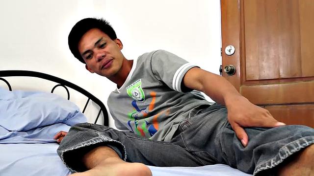 The gorgeous gay Asian twink Argie shows off his beautiful Asian boy feet for you