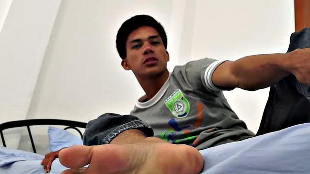 The gorgeous gay Asian twink Argie shows off his beautiful Asian boy feet for you