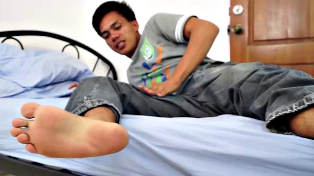 The gorgeous gay Asian twink Argie shows off his beautiful Asian boy feet for you