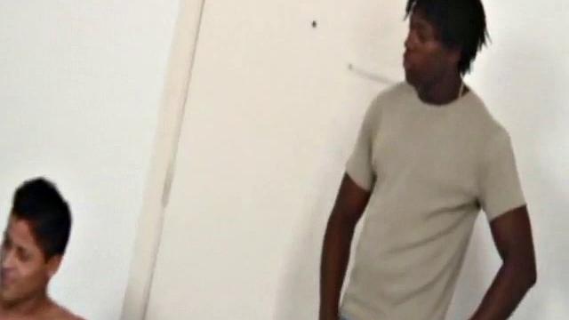 Martino Paiva and Nuno Santos in bed for a romp. They aren't hard for long before Josue Otaviano joins. He gets his big black cock out for them.