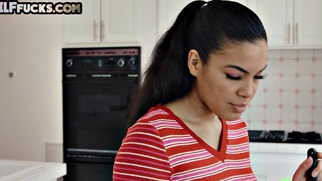 Busty GILF with huge tits bounces on young dick