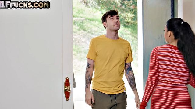 Busty GILF with huge tits bounces on young dick