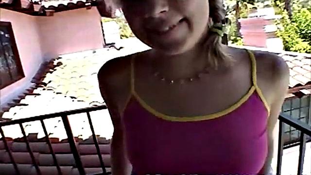 Little Summer walks up on the balcony and gets horny. She shows her natural tits and pussy. She rubs her pussy close-up and fingers hard until cum