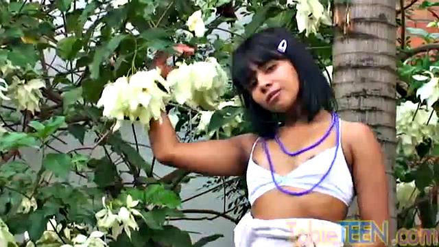 Watch as Latina teen Tobie Teen fingers her pussy at the garden in her tiny titties