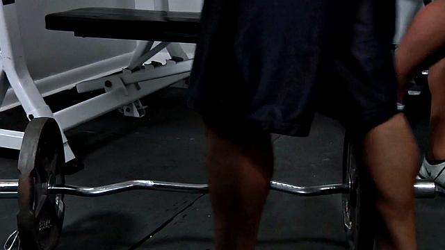 Deepthroating gym jock gets fucked in asshole by gym partner