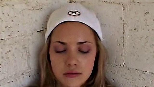 Little April rubs her pussy at the baseball field