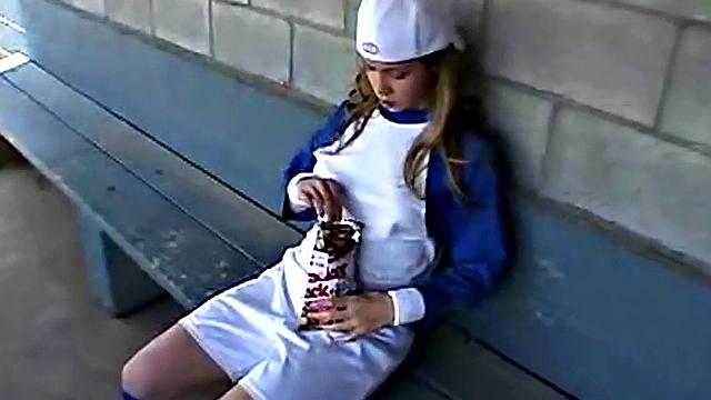 Little April rubs her pussy at the baseball field