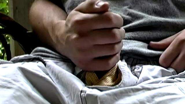 Adorable 18 year old Donavin Fitch finds himself at the country cabin and horny as hell. On the cabin porch, he parks himself in a chair and pulls out his growing cock.