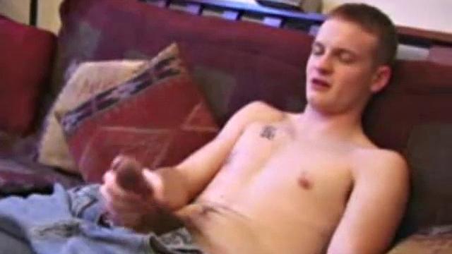 After working up his boner through pants, Lex Python strips down and strokes his cock to a porn video. He lubes up his asshole, fingers it, uses a jelly probe, beats off in several positions, and busts his nut.