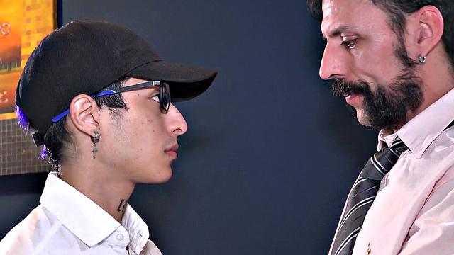 Tattooed daddy fucks skinny Latin twink in his office
