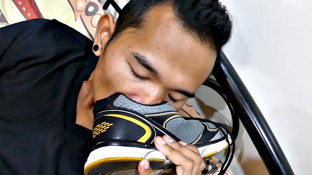 Joshua is a kinky Asian boy who gets off on male feet. He just got home from a long day at work, and nothing turns him on more than the sweet aroma of his Asian boy feet that have spent all day penned up in his shoes.