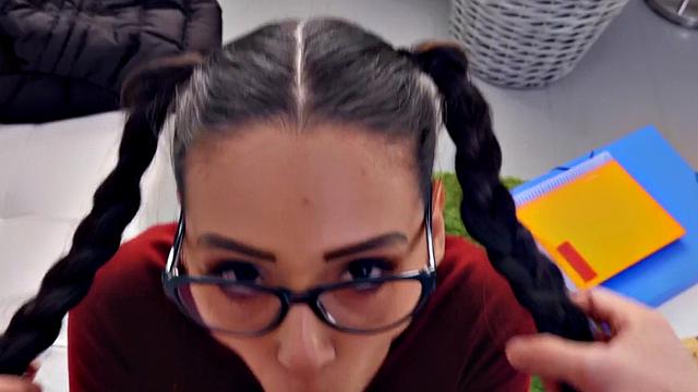 A hot teen with glasses and pigtails get down and dirty before riding a hard cock in POV