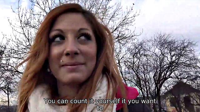 Watch this red-headed teen babe get paid for a POV blowjob and handjob in the outdoors