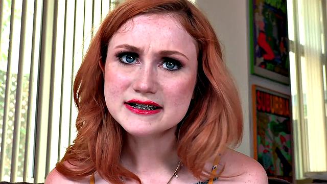 Redhead slut with glasses and small boobs blows in POV