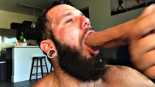 Bearded jock rides huge dildo while masturbating