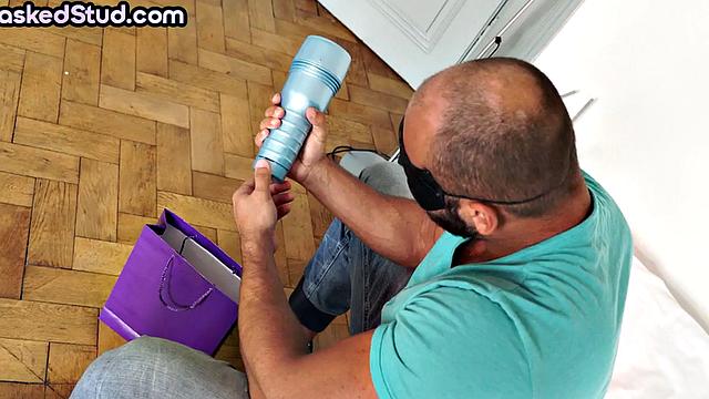 Masked massive hunk toys cock and cums in solo action