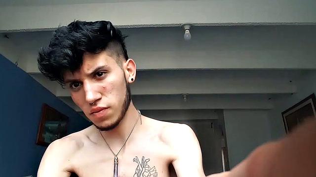 Our featured solo boy of the week is a bearded young man who just wants to be known as Pervert Boy. The skinny and smooth Latino strips to his underwear and gives us a look at his bubble butt, before revealing his big stiff cock.