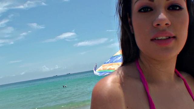 Miami brunette with a bald pussy gets nailed from behind and takes a cumshot on her face