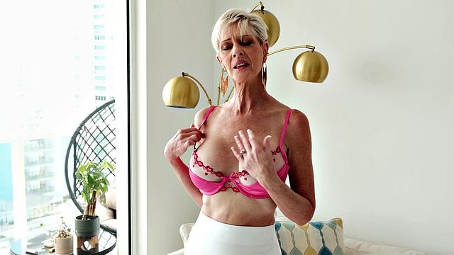 Meet Foxxxy, a 60-year-old wife, MILF and GILF with big tits and a pierced clit