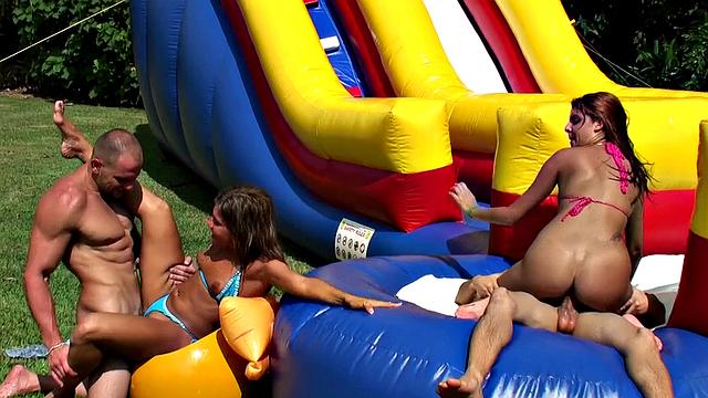 Latina babe with tattoos gets her bald pussy drilled in a wild outdoor group sex