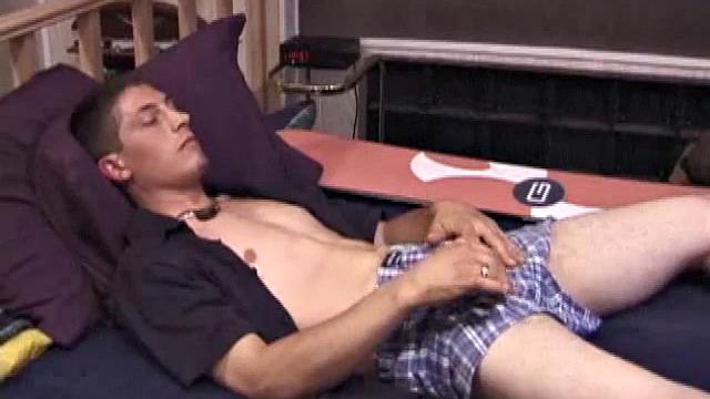 Dakota is on the bed, as he finds a spot in the porn video that stimulates him. After stripping naked, the young man jerks off and fingers his ass, until he explodes all over his chest with a nice warm cum load.