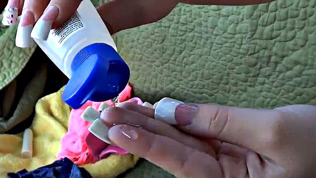 Britney Blue rubbing pussy and using Dildo