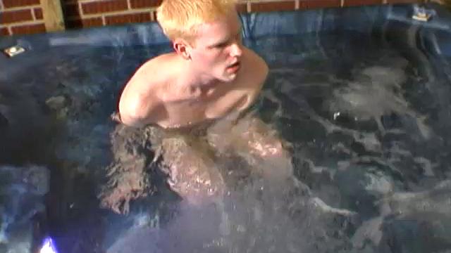 Horny 18 year old Andrew is naked in the hot tub when the urge to jerk off overcomes his blond self. The boy starts working on his big dick and soon it's rock hard.