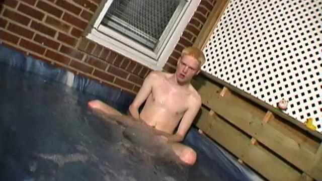 Horny 18 year old Andrew is naked in the hot tub when the urge to jerk off overcomes his blond self. The boy starts working on his big dick and soon it's rock hard.