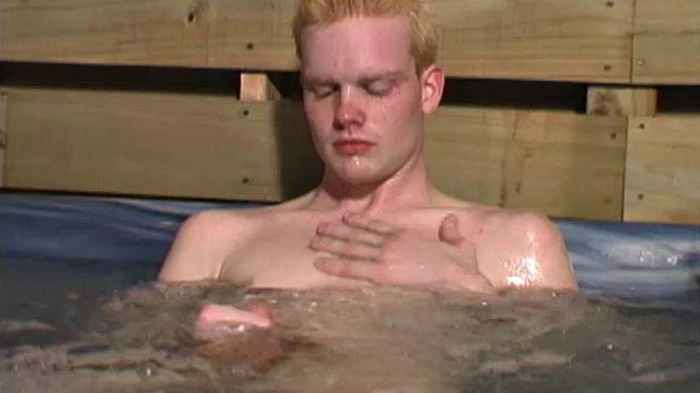 Horny 18 year old Andrew is naked in the hot tub when the urge to jerk off overcomes his blond self. The boy starts working on his big dick and soon it's rock hard.